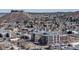 Scenic aerial view featuring a modern residential building complex nestled among the natural landscape and surrounding neighborhood at 20 Wilcox St # 203, Castle Rock, CO 80104