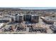 Elevated view of a residential complex in a vibrant urban setting, near local shopping and surrounded by nature at 20 Wilcox St # 203, Castle Rock, CO 80104