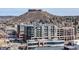 Modern building exterior with beautiful mountain views at 20 Wilcox St # 203, Castle Rock, CO 80104