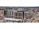 View of a modern apartment building featuring a convenient parking garage and easy access to urban amenities and city life at 20 Wilcox St # 203, Castle Rock, CO 80104