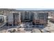 Attractive apartment building, showcasing modern design, street-level retail, and an inviting exterior in a vibrant urban setting at 20 Wilcox St # 203, Castle Rock, CO 80104