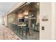 Modern golf simulator featuring signage, seating, table, sink, and bright light fixture at 20 Wilcox St # 203, Castle Rock, CO 80104