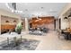 Beautiful lobby area featuring tables and seating, accent lighting, and tiled floors at 20 Wilcox St # 203, Castle Rock, CO 80104