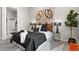 Stylish main bedroom decorated with modern wall art, and featuring neutral tones and a comfortable bed at 20 Wilcox St # 203, Castle Rock, CO 80104