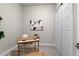 Cozy office space with natural light, modern desk, and a cow hide rug at 20 Wilcox St # 203, Castle Rock, CO 80104