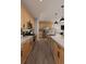 Modern kitchen design featuring stainless steel appliances, wood cabinets and light countertops at 17085 W 92Nd Loop, Arvada, CO 80007