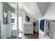 Modern bathroom with a glass shower, white tiled walls, and updated fixtures at 2358 N Ogden St # B, Denver, CO 80205