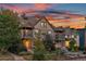 Charming multi-Gathering home with front yard landscaping and warm exterior lighting at 2358 N Ogden St # B, Denver, CO 80205