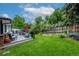 Large backyard offering a deck area for outdoor dining, relaxation, and entertainment at 14428 W Ellsworth Pl, Golden, CO 80401