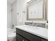 Bright bathroom features a combination shower/tub, vanity, and sink at 4286 S Eldridge St # 202, Morrison, CO 80465