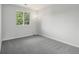 Bright and spacious bedroom features a large window and neutral walls at 4286 S Eldridge St # 202, Morrison, CO 80465