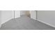 A neutral bedroom features gray walls and carpet, complemented by white trim and doors at 4286 S Eldridge St # 202, Morrison, CO 80465