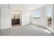 Bright bedroom featuring a bathroom and a balcony with beautiful scenic views at 4286 S Eldridge St # 202, Morrison, CO 80465