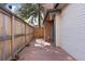 Backyard deck with wood fence and partial view of house exterior at 6358 S Jackson St, Centennial, CO 80121