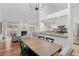 Dining area open to the living room and kitchen, ideal for entertaining at 6358 S Jackson St, Centennial, CO 80121