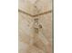Close-up of the shower features tiled walls, built-in niches, and modern fixtures at 6358 S Jackson St, Centennial, CO 80121