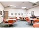 This communal area features tables and chairs for residents to socialize and play games at 720 S Clinton St # 2D, Denver, CO 80247