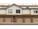 Multi-car garage with traditional doors at 3026 W Prentice Ave # H, Littleton, CO 80123