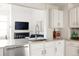 Open kitchen showcases modern finishes, stainless appliances, and seamless connection to living space at 3026 W Prentice Ave # H, Littleton, CO 80123