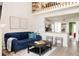 Inviting living room with loft, plush seating, and seamless flow to the modern kitchen at 3026 W Prentice Ave # H, Littleton, CO 80123