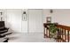 Open loft area with plush chair, plants, and three closets at 3026 W Prentice Ave # H, Littleton, CO 80123