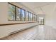 Bright, large room with many windows and tile floor. Great natural light at 30671 Bearcat Trl, Conifer, CO 80433