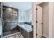 Contemporary bathroom featuring a soaking tub, tiled shower with glass door and modern fixtures at 1895 York St, Denver, CO 80206