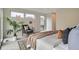 Cozy main bedroom features ample natural light, stylish furnishings, and comfortable seating area at 1895 York St, Denver, CO 80206