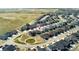 Beautiful aerial view of a modern home in a well-planned community with green spaces and meticulously landscaped surroundings at 7051 S White Crow Way, Aurora, CO 80016