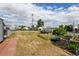 Wide shot of the backyard with a shed and a small trailer at 334 S 7Th Ave, Brighton, CO 80601