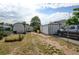 The backyard features a shed, a car, and a partial lawn at 334 S 7Th Ave, Brighton, CO 80601