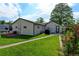 A lush green backyard with brick walkway at 334 S 7Th Ave, Brighton, CO 80601