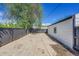 The spacious backyard features a concrete pad perfect for outdoor entertaining or parking at 3064 S Galapago St, Englewood, CO 80110