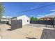 Backyard featuring a concrete pad and a low maintenance rock garden in a fully fenced yard at 3064 S Galapago St, Englewood, CO 80110