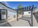 The backyard boasts a charming pergola feature and a low-maintenance rock ground cover at 3064 S Galapago St, Englewood, CO 80110