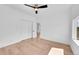 Spacious bedroom features a ceiling fan, closet and plenty of natural light at 3064 S Galapago St, Englewood, CO 80110