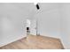 Bright bedroom featuring a ceiling fan, modern lighting, and wood-look flooring at 3064 S Galapago St, Englewood, CO 80110