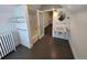 Well-lit bathroom featuring a classic sink, tile flooring, and a glass-enclosed shower at 1453 Vine St, Denver, CO 80206