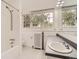 Bright bathroom featuring a claw foot tub and a traditional style at 1453 Vine St, Denver, CO 80206