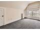 Bedroom with gray carpet, radiator and window with window coverings at 1453 Vine St, Denver, CO 80206