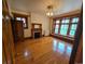 Bedroom featuring hardwood floors, decorative fireplace, and window nook providing natural light and charm at 1453 Vine St, Denver, CO 80206