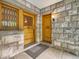 Charming stone entryway with well-maintained wooden doors and a classic, inviting aesthetic at 1453 Vine St, Denver, CO 80206