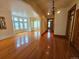 Spacious living room with hardwood floors, bright windows, and elegant arches creating an inviting atmosphere at 1453 Vine St, Denver, CO 80206