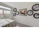 Bedroom with natural light, decorated with automotive decor at 1176 Sugarloaf Ln, Erie, CO 80516