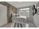 Cozy bedroom featuring garage theme decor and a comfortable bed at 1176 Sugarloaf Ln, Erie, CO 80516