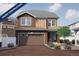 Two story home with a two car garage and landscaping, property is under construction at 1176 Sugarloaf Ln, Erie, CO 80516