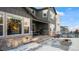 Stone patio in backyard with grill and a fire pit perfect for outdoor living at 6922 Copper Sky Cir, Castle Pines, CO 80108