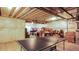 Unfinished basement featuring a ping pong table, awaiting your creative design ideas at 6922 Copper Sky Cir, Castle Pines, CO 80108