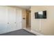 Bright bedroom with double bed, window, and neutral wall tones at 6922 Copper Sky Cir, Castle Pines, CO 80108
