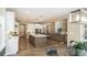Open concept kitchen with island and stainless steel appliances at 6922 Copper Sky Cir, Castle Pines, CO 80108